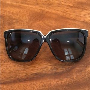 Valentino sunglasses with protective case.